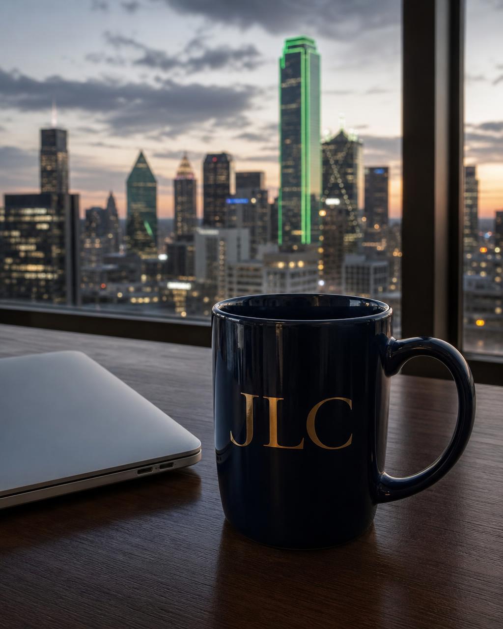 Dallas skyline at dusk seen through an office window